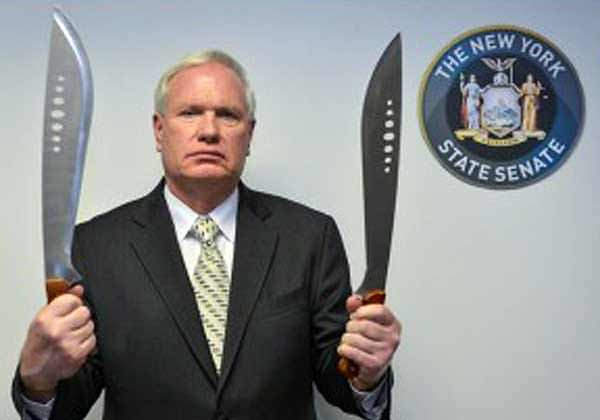 NY Sen. Avella with the two scariest Machetes he could find.