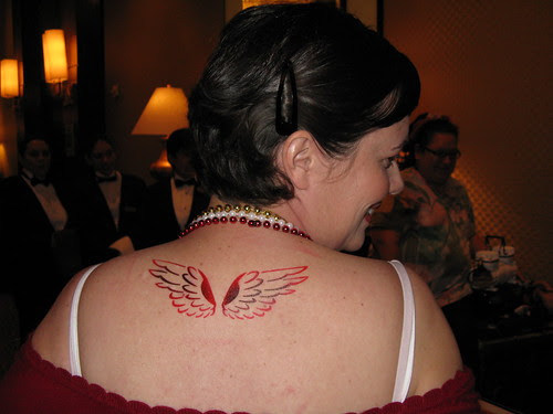 Bird Tattoos Design on Upper Back Women