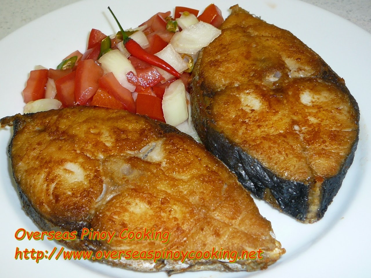 Fried Tanguigue Steak with Tomato Onion Chili Relish