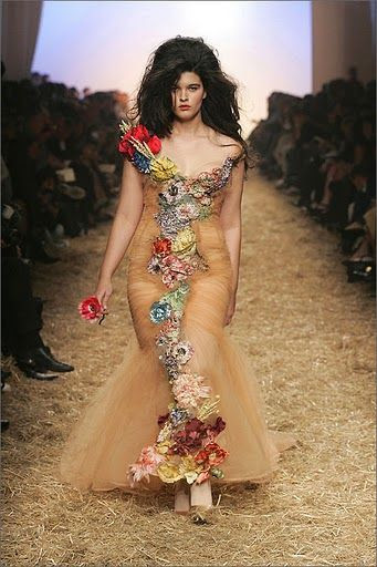 Jean Paul Gaultier's design house shows that beauty isn't only in a size zero! Stunning model and gown!
