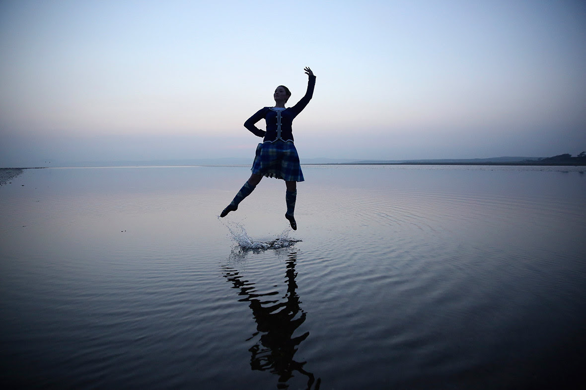 Scottish country dancer Mairie McGillivray, 16, dances on the beach on the Hebridean island of Islay. She says she'll vote 