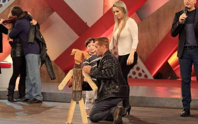 Marcos Oliver com a mulher e o filho