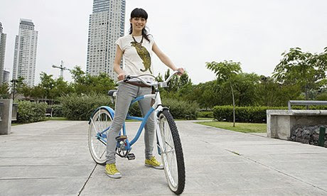 Young woman on bike