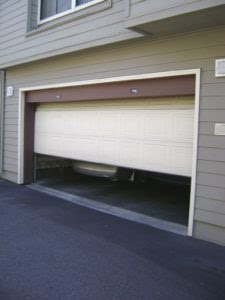 Garage Door Repair - Broken Garage Door 225x300