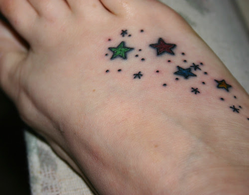 Female Star And Flower Tattoos. star flower foot tattoo
