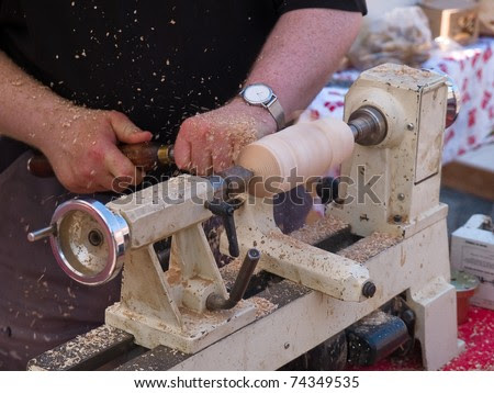 Wood Turning Craft Work On A Lathe Manufacturing Furniture