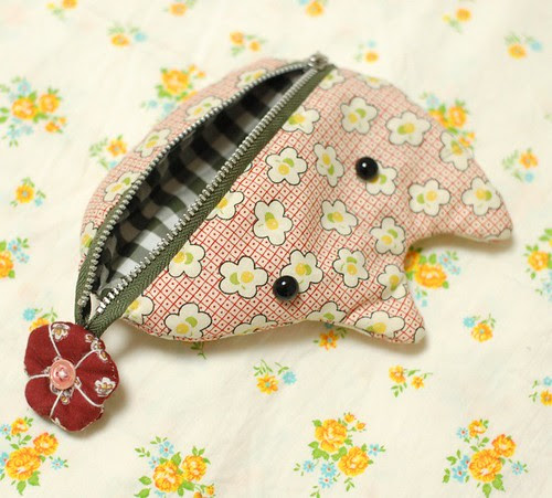 A dog brought you a flower pouch