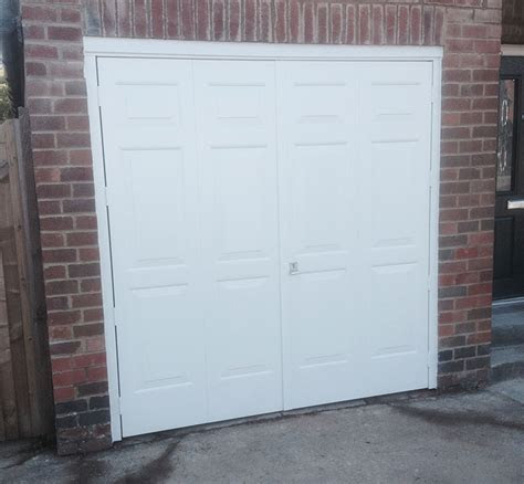 Rather than mess with opening your garage door manually each time you come home, with an electric ga. Cardale Steel Side Hinged Garage Door in White - Elite GD
