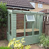 Small Wooden Potting Shed : To get into the gardening spirit, the blogger added a sawhorse potting bench and.