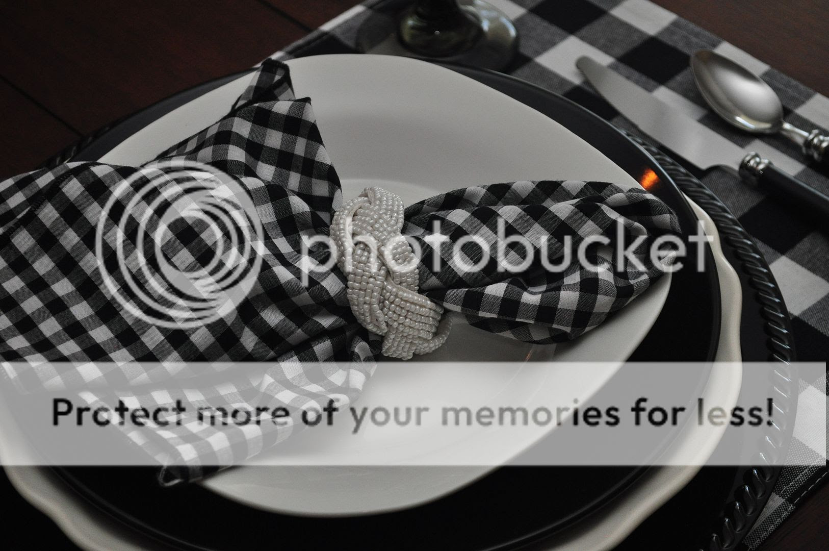 A table set in black & white buffalo check