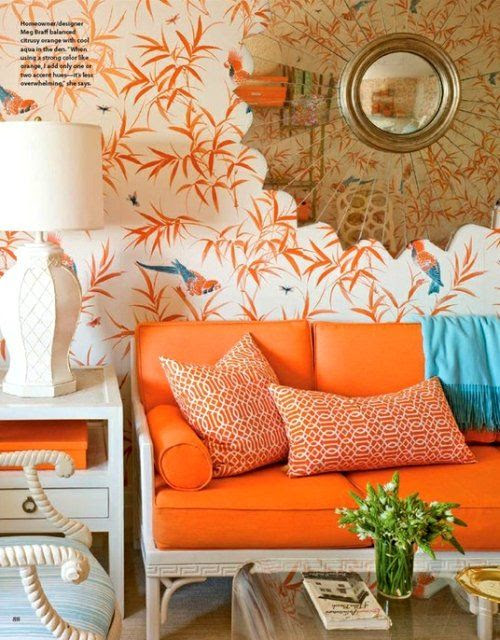 Love this orange couch! Bold home decor choice. #homedecor #wallpaper #decoratingideas