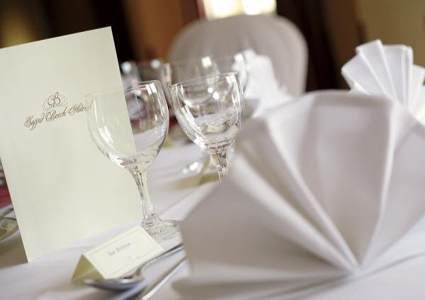 If your ideal wedding is simple and clean, I would stick with white linens 