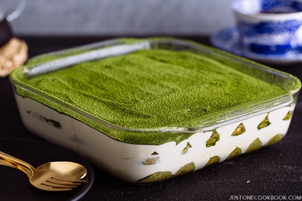 Matcha Tiramisu in a clear glass baking sheet.