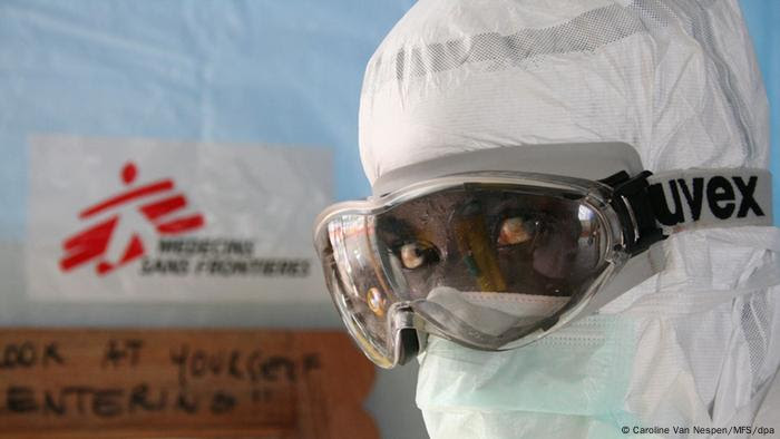 Portrait of an MSF workers wearing an infection protection suit