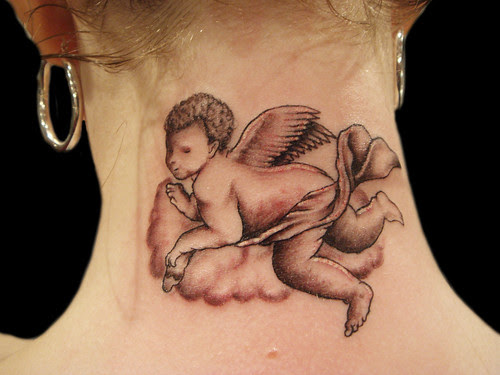 Cherub tattoo by Miguel Angel tattoo. Miguel Angel Custom Tattoo Artist 
