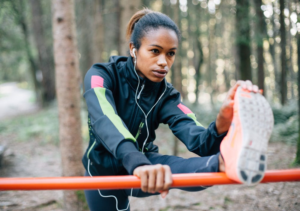 woman running stretching fitness exercise jogging