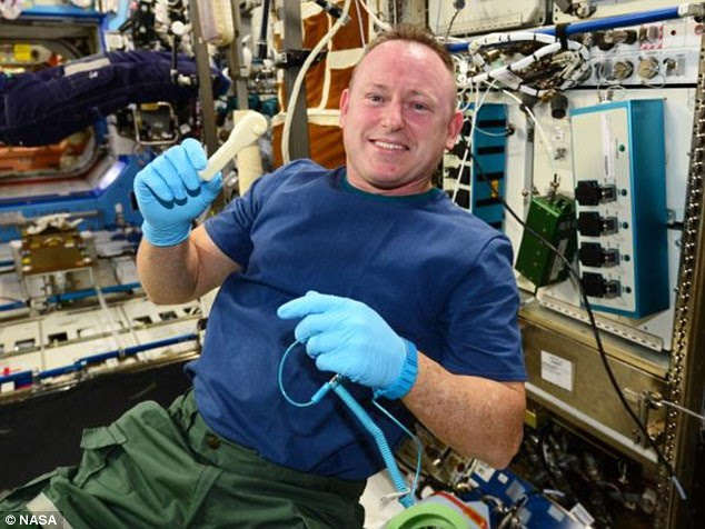 Installed: Astronaut Barry 'Butch' Wilmore initially installed the 3-D printer and recently received the wrench he needed from the 3-D printer