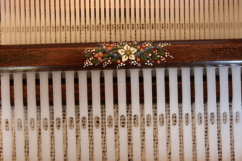 Custom staining and decorating of the heddles