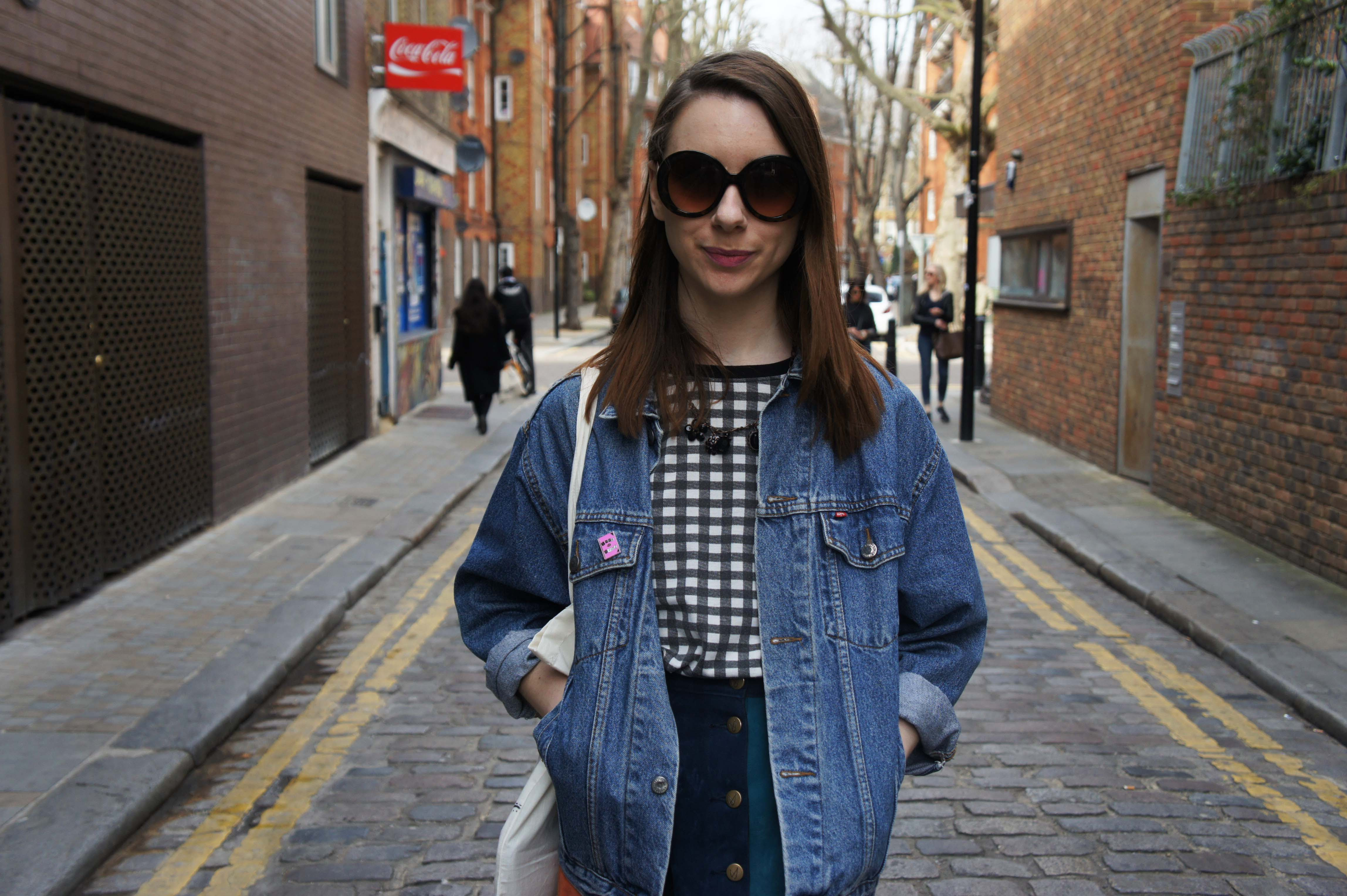 Mink Pink suede stripe skirt, socks and sandals, a check tee and a denim jacket outfit