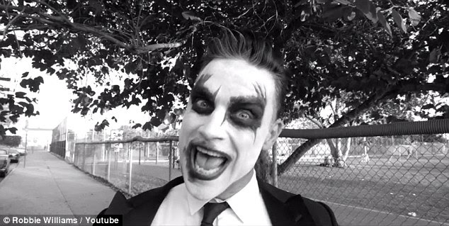 Surprise: Robbie Williams has used the interest generated by the birth of his son, Charton Valentine, to announce his plans to go on a new tour