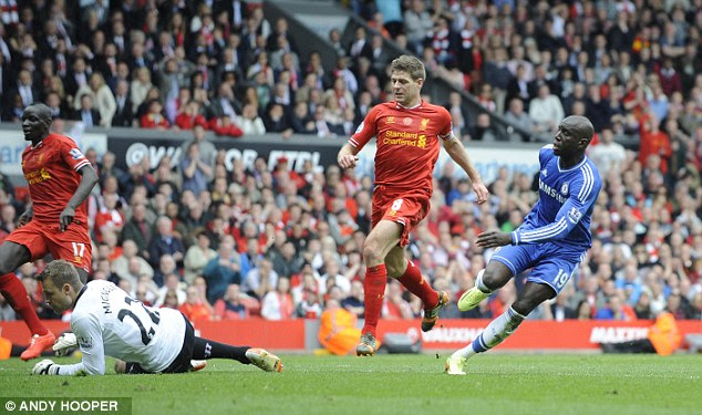 Anguish: Gerrard couldn't believe his error as Ba slipped the ball underneath goalkeeper Simon Mignolet