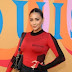 Shay Mitchell slays ouis Vuitton Double Jersey Mini Wrap Skirt and Louis Vuitton Since 1854 Dauphine MM in Louis Vuitton 200 Trunks, 200 Visionaries: the Exhibition 