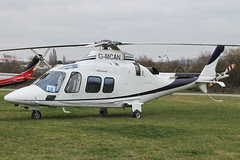 G-MCAN - 2006 build Agusta A109S Grand, at the 2012 Cheltenham Festival