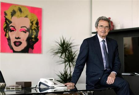 Franco Bernabe, Telecom Italia chairman and CEO, poses in his office in Rome, April 19, 2013. REUTERS/Alessandro Bianchi