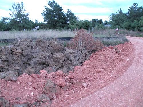 Red dirt spread all the way across parts of right of way for Pinnacle Prairie trail on July 28, 2009. DSCN7814