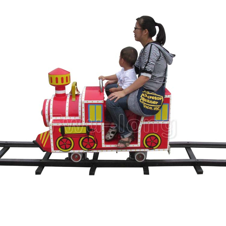 kids ride on train with track