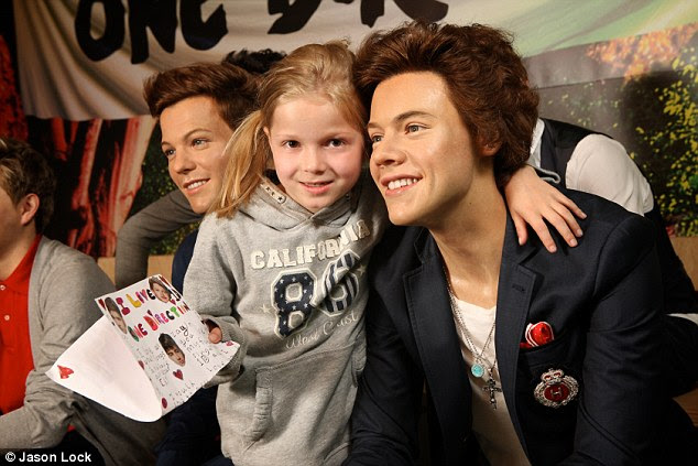 Starstruck: Remi Ryles, aged nine, hand delivered her letter to One Direction at Madame Tussauds