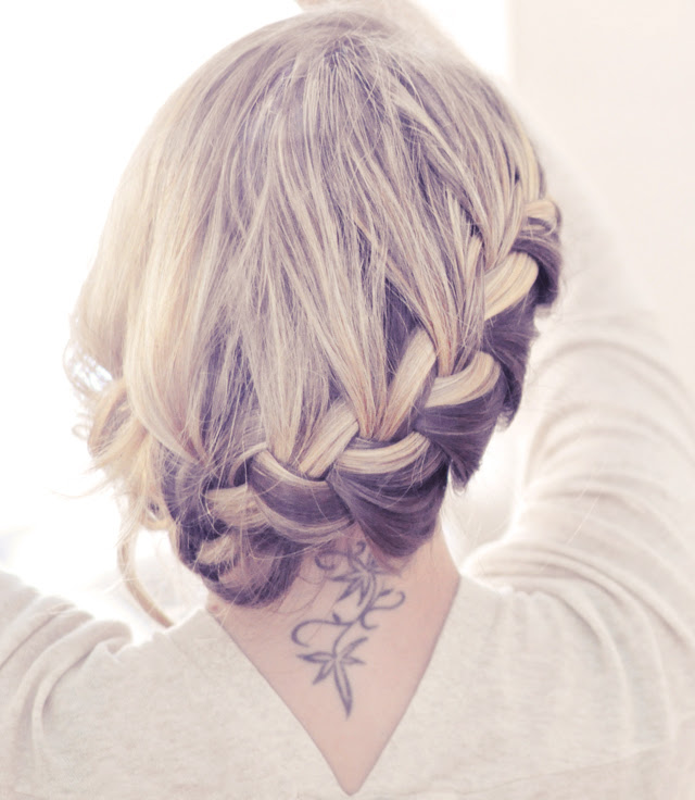 full side french braid low updo wearing the braid out 