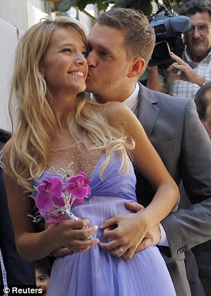 Affection: Michael couldn't keep his hands or lips of his gorgeous bride