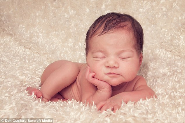 Relaxed: Gianna, six days old, from Conshohocken, proves to be perfect model material 