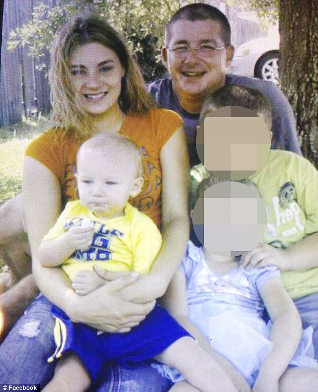 Police reported that the stolen vehicle was recovered about 15 to 20 minutes later but Lonzie was not found inside (the boy pictured above with his parents, Lonna Barton and Christopher Barton)