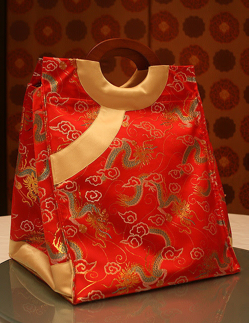 The Imperial Pen Cai takeaway comes in a festive carrier inspired by imperial robes