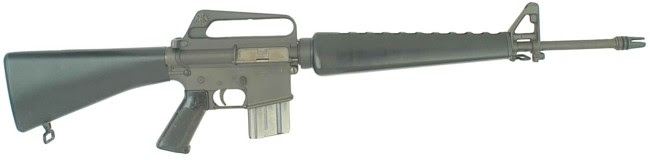 Early model M16 rifle, as used by US AF, with early military issue 20-round magazine. Note the three-prong flash hider and the lack of forward assist