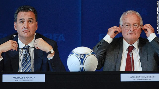 Michael Garcia (left) handed his report on the bidding process for the 2018 / 2022 World Cups to the FIFA Ethics Committee. Garcia has also called for the findings of his report to be made public.