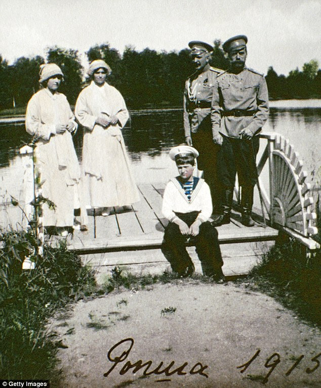 Happy times: Within a year of the album's latest photos, the Russian revolution swept across the country, Tsar Nicholas II abdicated and he and his family were exiled, before being murdered on Lenin's orders
