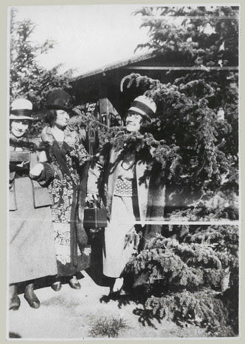 Three girls in the bushes