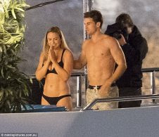 Hands on: The brown-haired Lothario put a comforting hand on her back as the pair entered the hot tub
