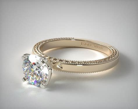 What is the significance of the e. Etched Profile Solitaire Engagement Ring | 14K Yellow Gold