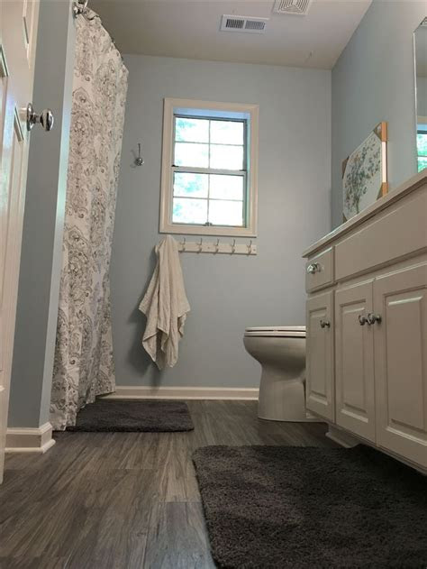 Many people have used laminate floor. My finished bathroom! Traffic Master Allure Plus 5" vinyl