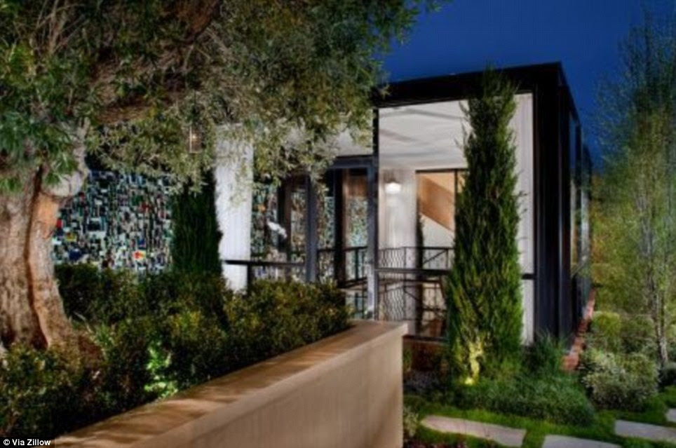 Room for everyone: The estate includes a detached guest house modeled after the Philip Glass House in Connecticut 
