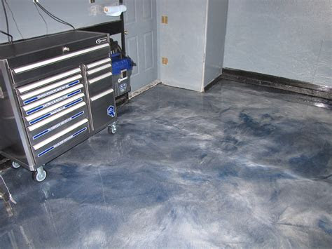 Gray polycuramine 1 car garage floor kit (2 pack) offers unsurpassed durability. Garage Floor Coated With Metallic Epoxy | MVL Concretes' Blog