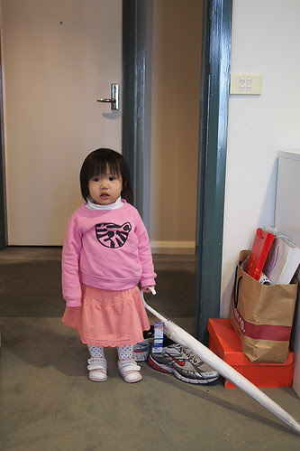 Tiny human with umbrella