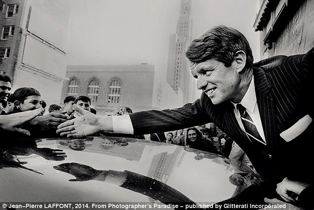 Brooklyn, New York / April 1, 1968: Presidential candidate and New York senator Robert Kennedy greets supporters during a campaign stop in Fort Greene