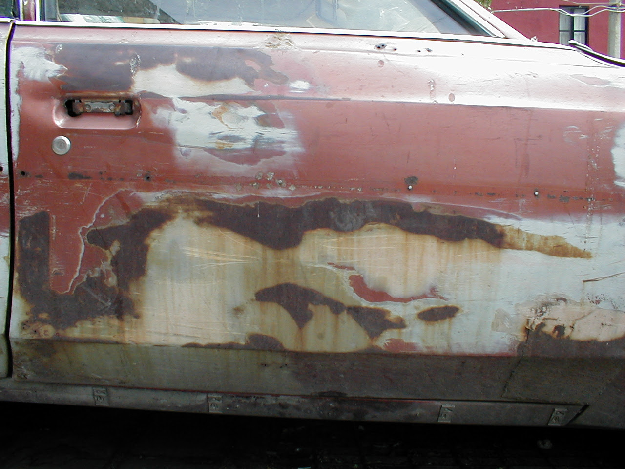 dario door car rusted old damaged