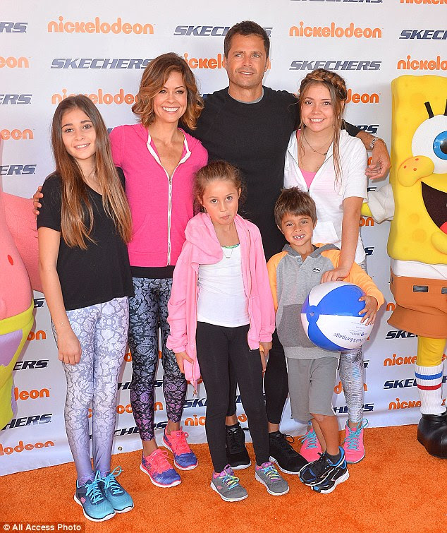 Gorgeous family: She posed with husband David Charvet and her four children