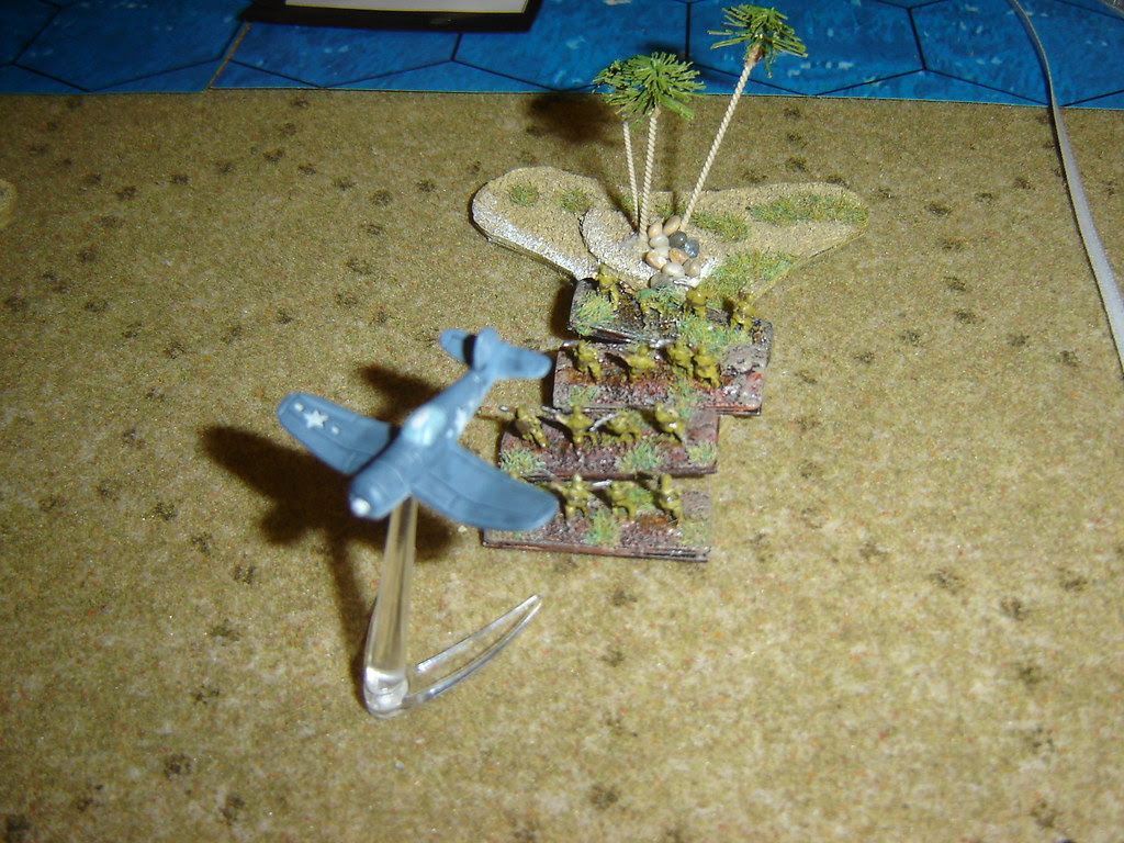 Corsair strafes Japanese infantry in jungle